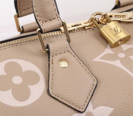 Louis Vuitton Bicolor Monogram Empreinte Leather Speedy Bandouliere 25 Handbag In Tourterelle Gray And Cream