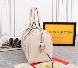 Louis Vuitton Bicolor Monogram Empreinte Leather Speedy Bandouliere 25 Handbag In Cream And Bois De Rose Pink