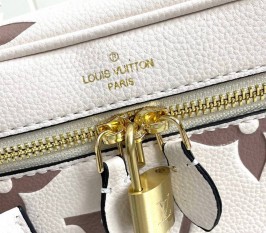 Louis Vuitton Bicolor Monogram Empreinte Vanity PM Handbag In Cream And Bois De Rose Pink