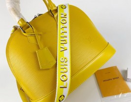 Louis Vuitton Epi Leather Alma MM  Handbag In Cedrat Yellow With Jacquard Strap