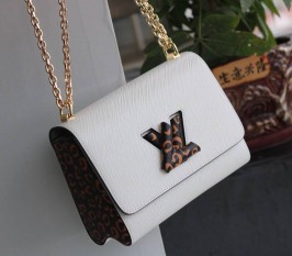 Louis Vuitton Epi Leather Jungle Edition Twist MM Quartz Bag In White