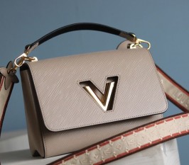 Louis Vuitton Epi Leather Twist MM Handbag In Galet Gray With Embroidered Strap