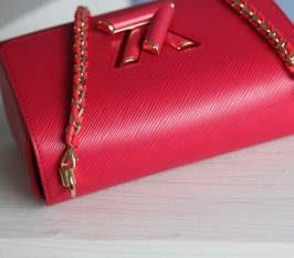 Louis Vuitton Epi Leather Twist MM Bag In Red