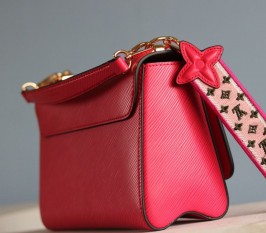Louis Vuitton Epi Leather Twist MM Handbag In Red With Embroidered Strap