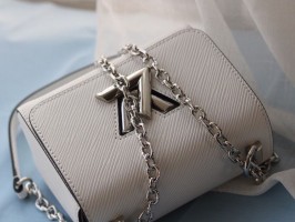 Louis Vuitton Epi Leather Twist Mini Bag In White