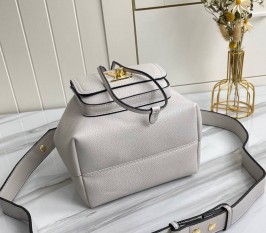 Louis Vuitton Lockme Bucket Bag In Greige
