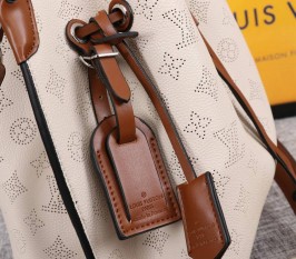 Louis Vuitton Mahina Muria Bag In Cream