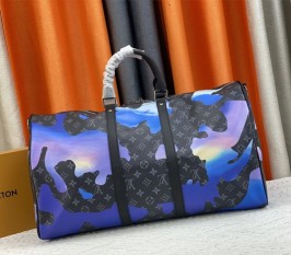 Louis Vuitton Monogram Eclipse Keepall 55 Bandouliere Travel Bag In Blue Sunrise