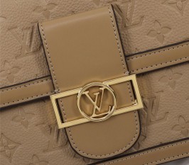 Louis Vuitton Monogram Empreinte Dauphine Bag In Brown