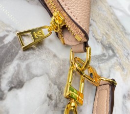 Louis Vuitton Monogram Empreinte Leather Bagatelle Mini Hobo In Beige