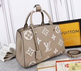 Louis Vuitton Monogram Empreinte Leather Montaigne MM Handbag In Tourterelle Gray