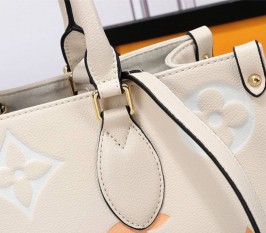 Louis Vuitton Monogram Empreinte Leather Onthego MM Bag In Cream Saffron