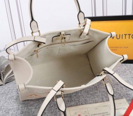 Louis Vuitton Monogram Empreinte Leather Onthego MM Bag In Cream Saffron