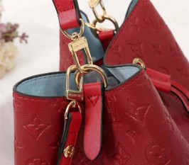 Louis Vuitton Monogram Empreinte NeoNoe MM Bag In Red