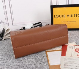 Louis Vuitton Monogram Empreinte Wild At Heart Onthego MM Tote In Caramel Brown