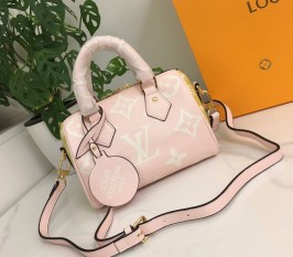 Louis Vuitton Oversized Monogram Pattern Empreinte Speedy Bandouliere 20 Handbag In Rose Beige