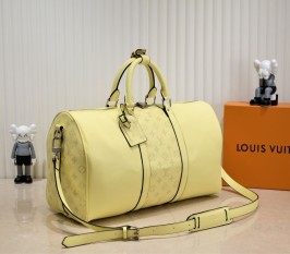 Louis Vuitton Taiga Leather Keepall Bandouliere 50 Travel Bag In Yellow