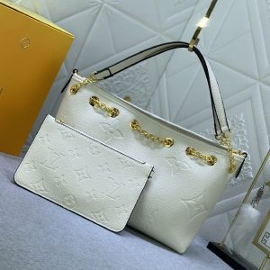 Louis Vuitton Monogram Empreinte Leather Bundle Bag In Cream - Image 2