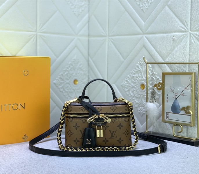 Monogram Reverse Canvas Vanity Chain Pouch In Black